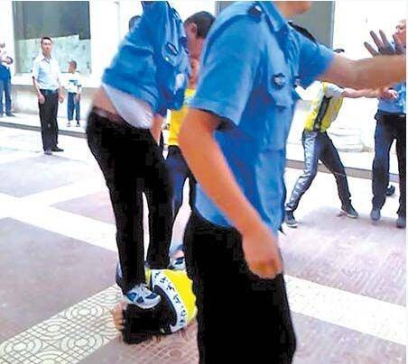 周晓明(辽宁城管暴力执法事件受害者)
